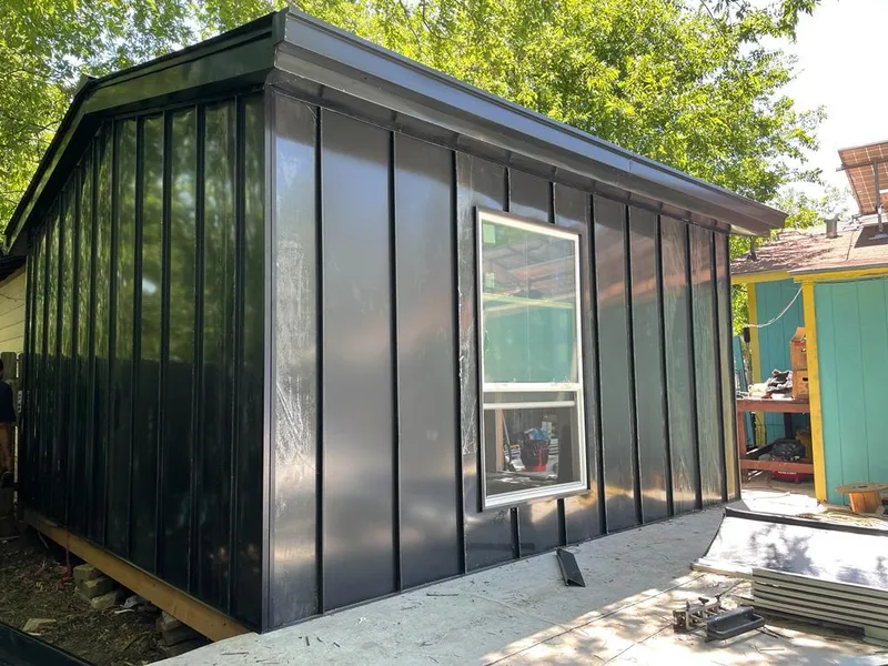 Black standing seam metal wall panels for Roof Inspection in San Benito