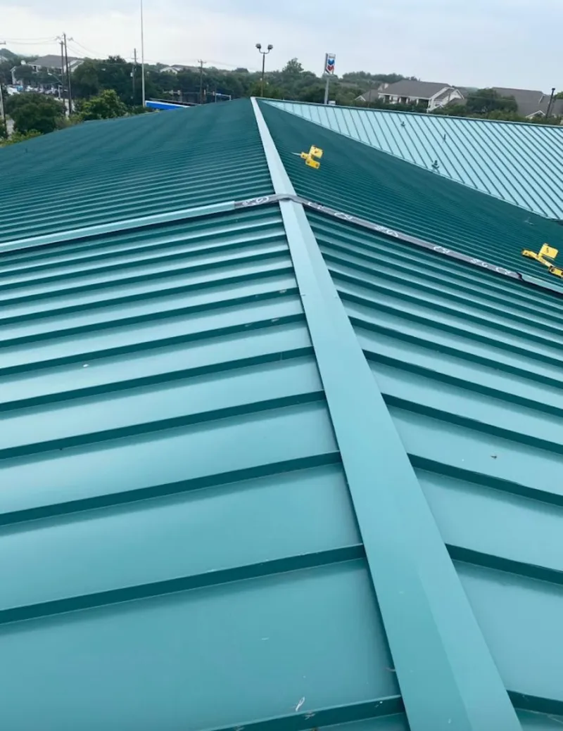 Green commercial metal roof ridge and valley for Metal Roof Repair in San Benito